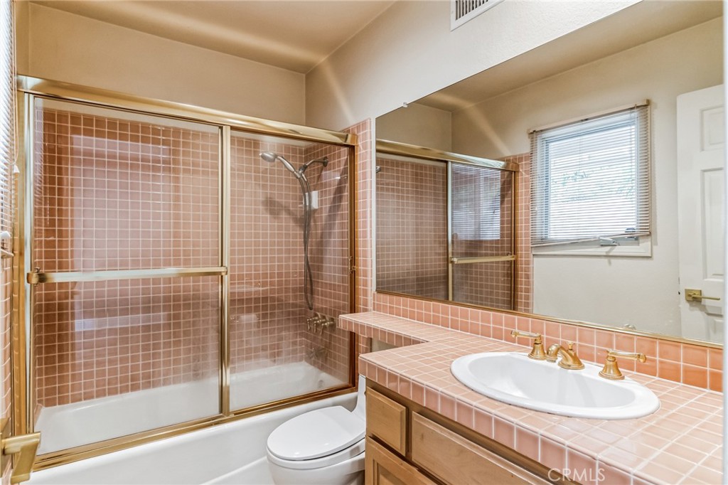 1432 Rutherford Drive Pasadena, CA 91103 - Photo 28 of 33 a bathroom with a sink toilet and shower