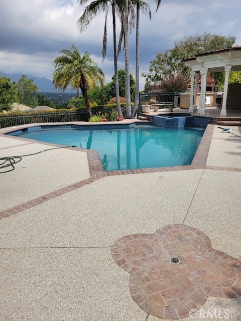 1432 Rutherford Drive Pasadena, CA 91103 - Photo 33 of 33 view of swimming pool with outdoor seating and plants