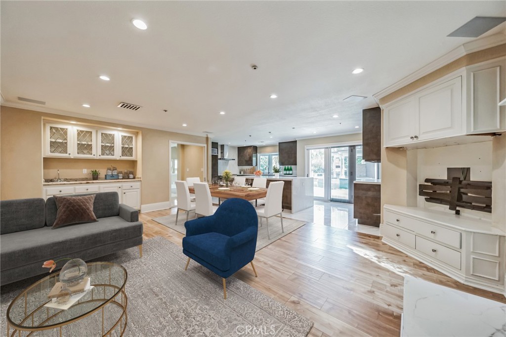 1432 Rutherford Drive Pasadena, CA 91103 - Photo 6 of 33 a living room with furniture kitchen view and a wooden floor