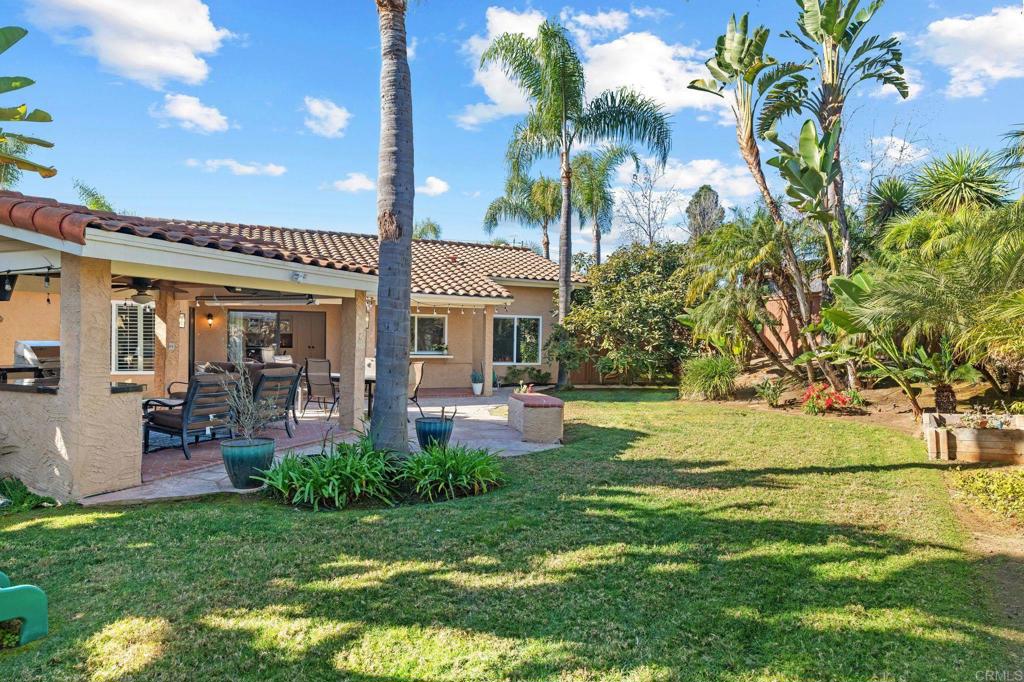 a front view of a house with garden and porch