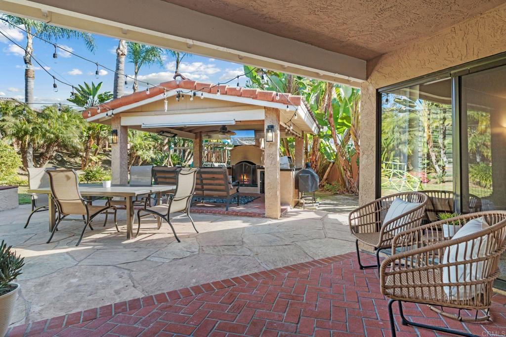 3402 Summer Set Way Oceanside, CA 92056 - Photo 3 of 24 a patio with table and chairs