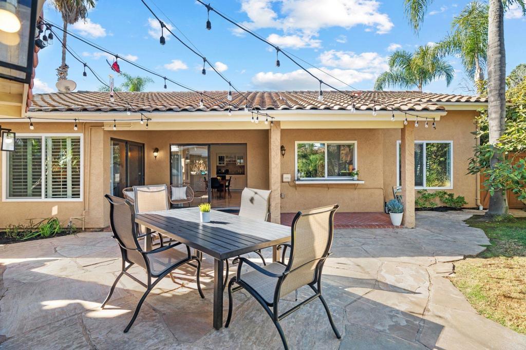 3402 Summer Set Way Oceanside, CA 92056 - Photo 5 of 24 a view of a patio with a table and chairs