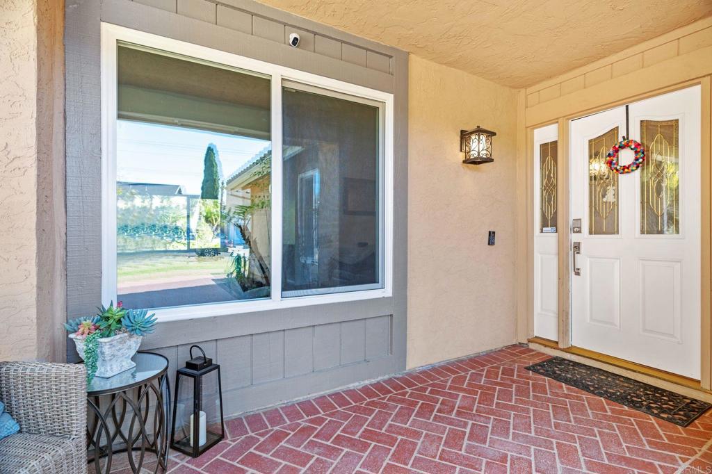 3402 Summer Set Way Oceanside, CA 92056 - Photo 8 of 24 a view of a hallway with a window