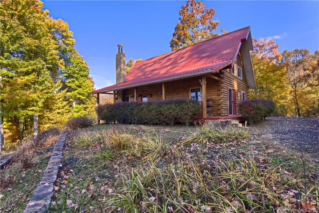 548 Miller Branch Road Mars Hill, NC 28754 - Photo 2 of 35 a front view of a house with a yard