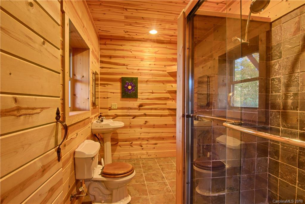 548 Miller Branch Road Mars Hill, NC 28754 - Photo 20 of 35 a bathroom with a shower