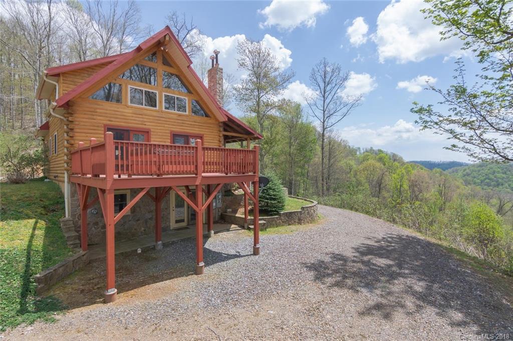 548 Miller Branch Road Mars Hill, NC 28754 - Photo 3 of 35 a view of a house with a yard balcony and furniture