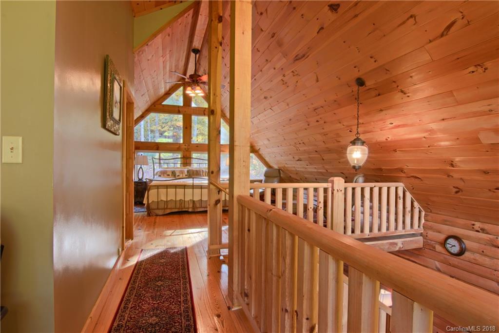 548 Miller Branch Road Mars Hill, NC 28754 - Photo 28 of 35 a view of staircase with white walls and a window