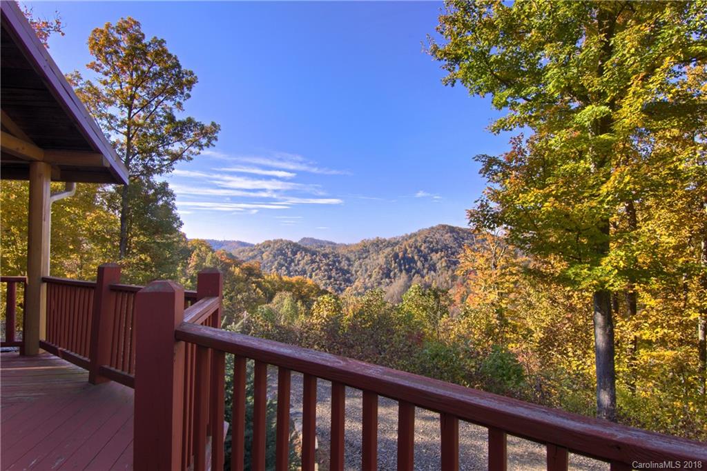 548 Miller Branch Road Mars Hill, NC 28754 - Photo 8 of 35 a view of a balcony with wooden fence