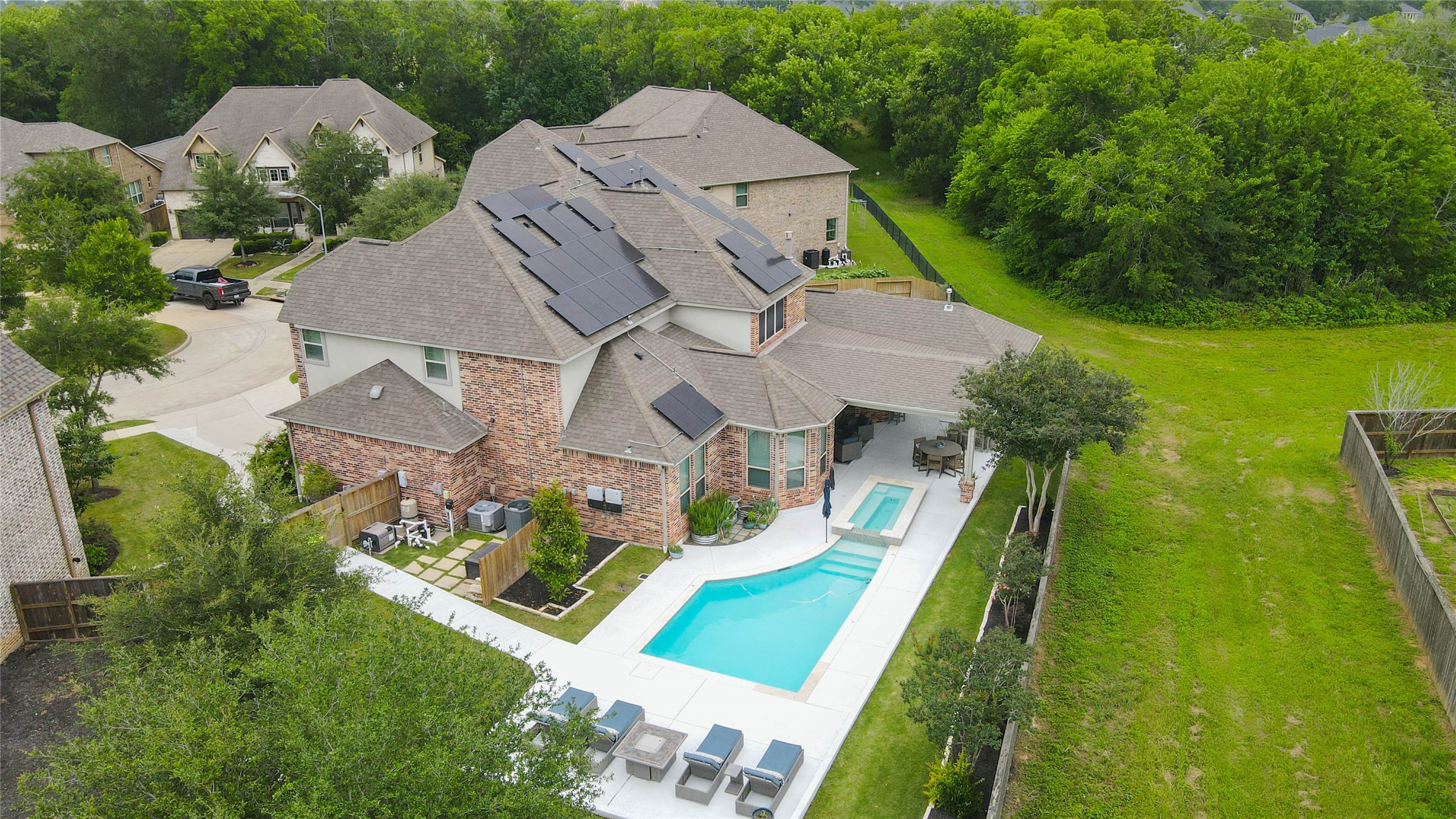 29903 Spring Side Court Fulshear, TX 77406 - Photo 48 of 50 an aerial view of a house with a yard