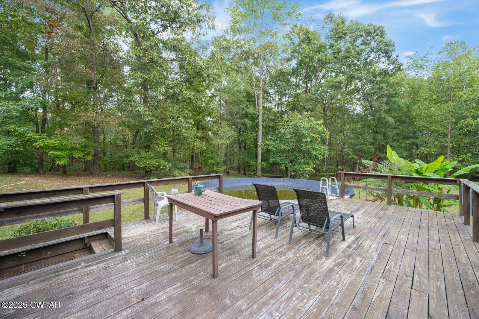 2400 Sand Ridge Bargerton Road Lexington, TN 38351 - Photo 32 of 48 a view of a outdoor seating area with furniture