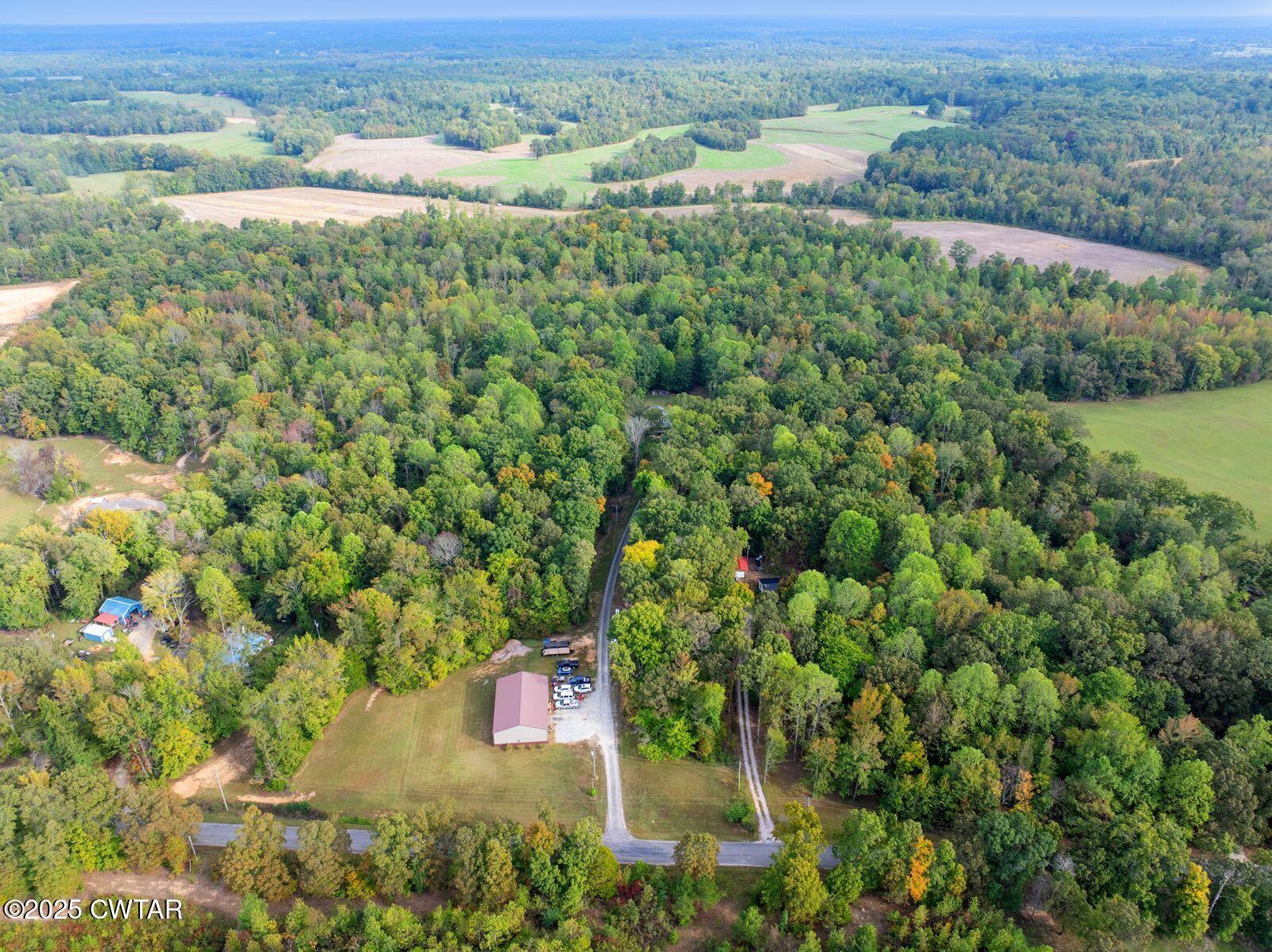 2400 Sand Ridge Bargerton Road Lexington, TN 38351 - Photo 45 of 48 an aerial view of a houses with a yard