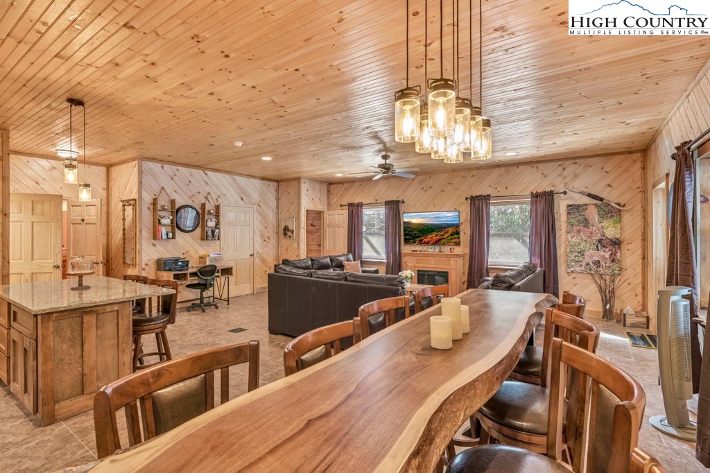 173 Spring Brook Road Newland, NC 28657 - Photo 30 of 39 a very nice looking dining room with a table and chairs