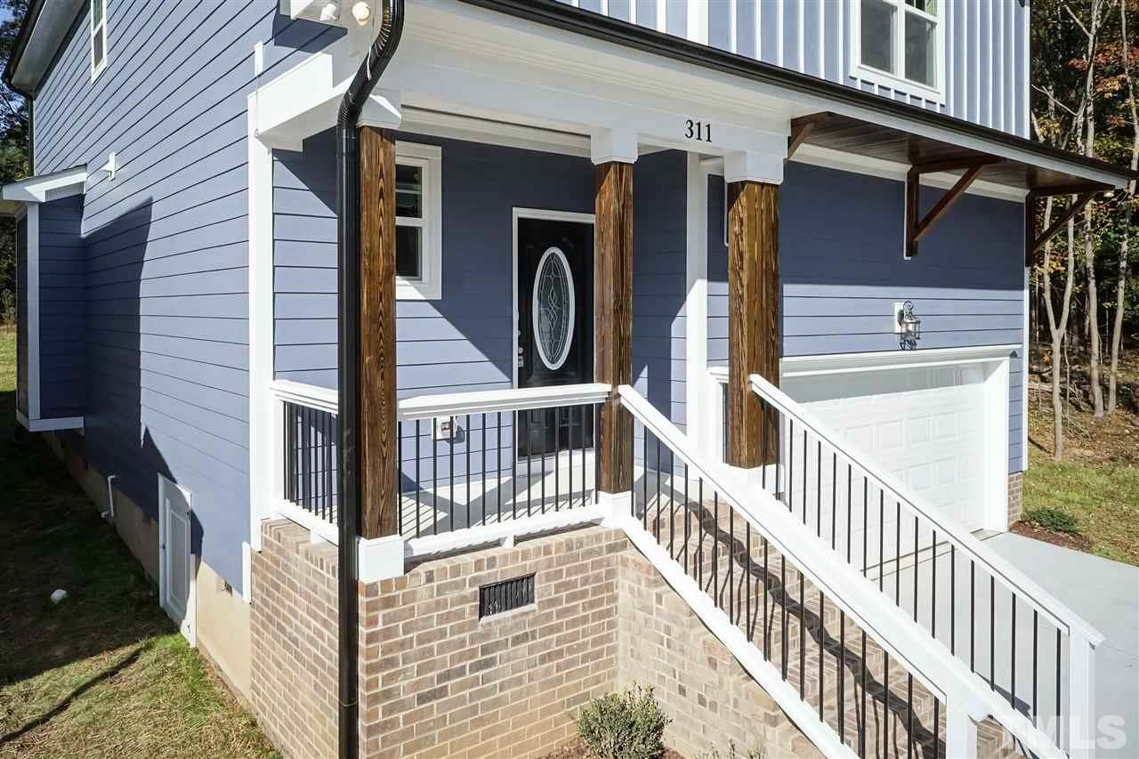 3430 Dutchman Road Raleigh, NC 27610 - Photo 14 of 21 a view of a house with wooden stairs