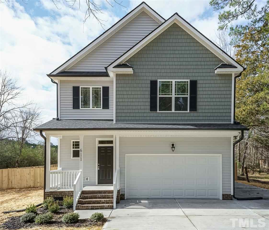 3430 Dutchman Road Raleigh, NC 27610 - Photo 19 of 21 a front view of a house with a garage