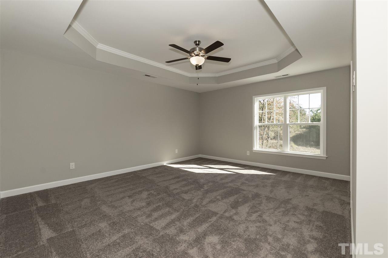 3430 Dutchman Road Raleigh, NC 27610 - Photo 9 of 21 a view of an empty room with a window