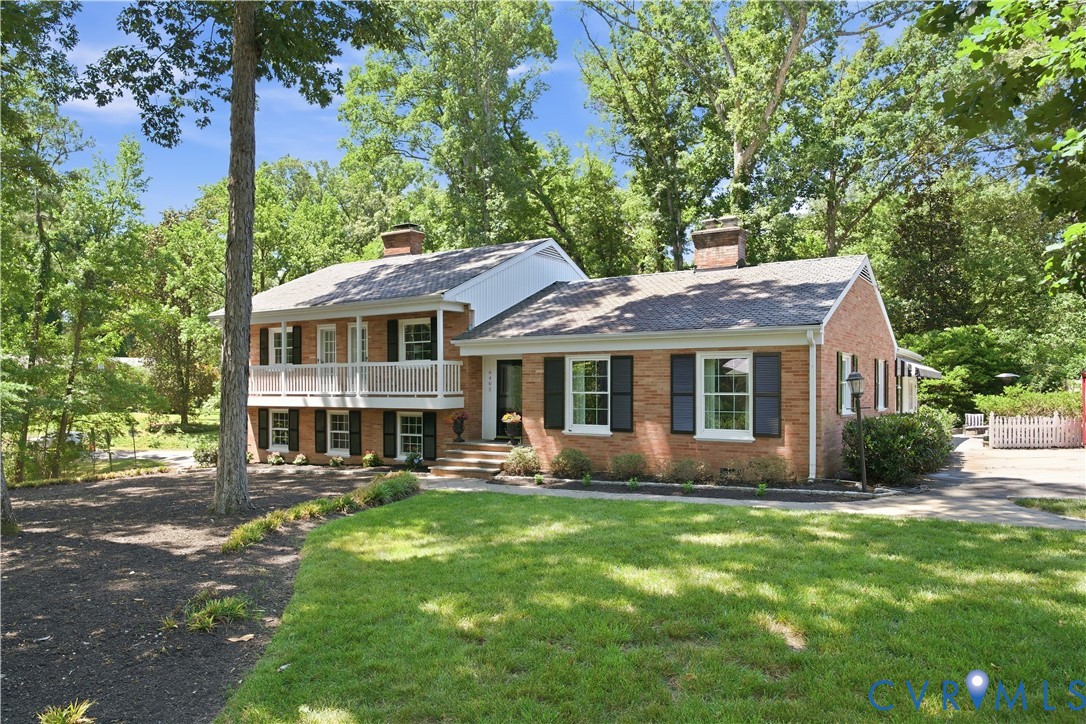6405 Buckhill Road Richmond, VA 23225 - Photo 70 of 71 Brick exterior featuring black shutters and a whit