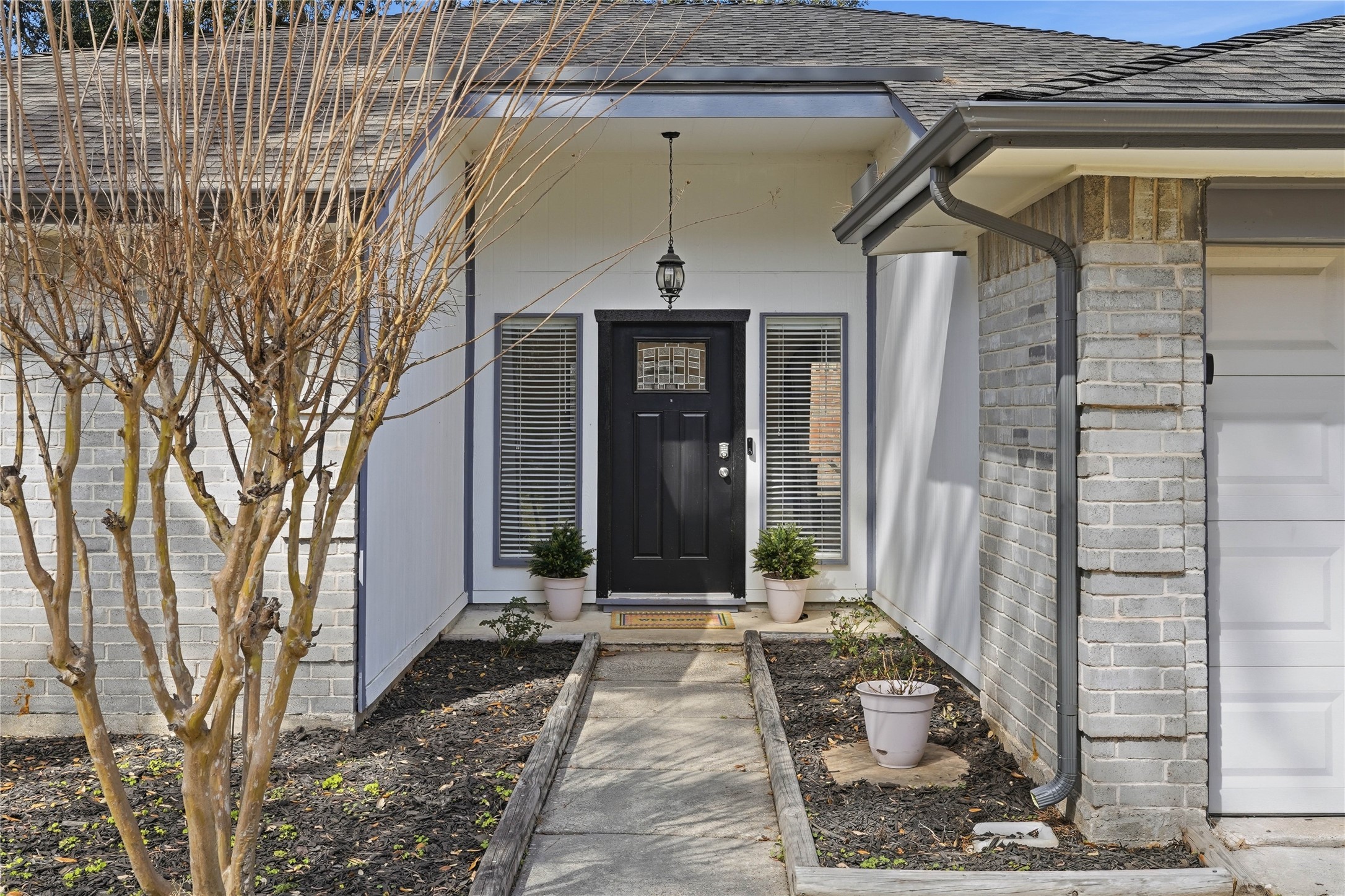 4506 Pineville Lane Spring, TX 77388 - Photo 6 of 33 a front view of a house with a glass door