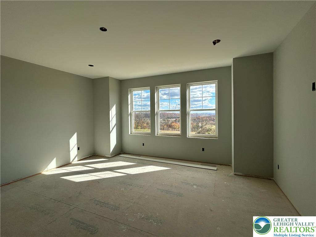 436 Willow Road, Unit LOT 15 Walnutport, PA 18088 - Photo 5 of 8 a view of an empty room with a window
