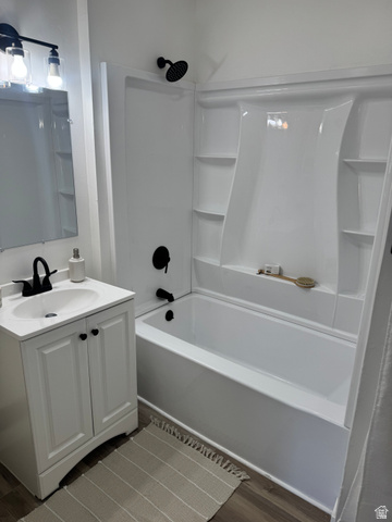 47 B Street Helper, UT 84526 - Photo 9 of 19 White bathroom vanity with cabinet storage and integrated sink