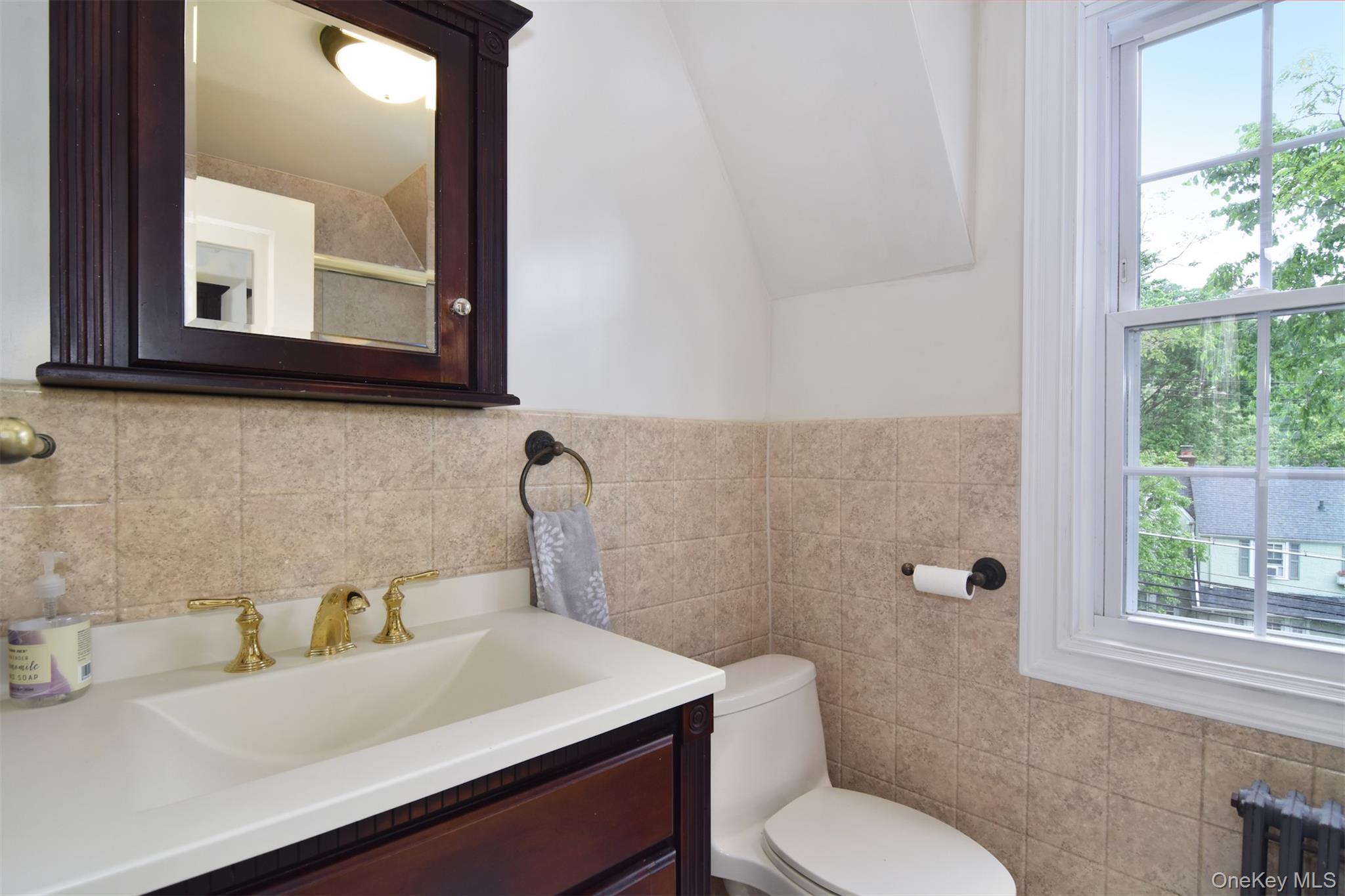 370 Scarsdale Road Tuckahoe, NY 10707 - Photo 24 of 25 Updated hall bath with tub/shower and sliding glass doors