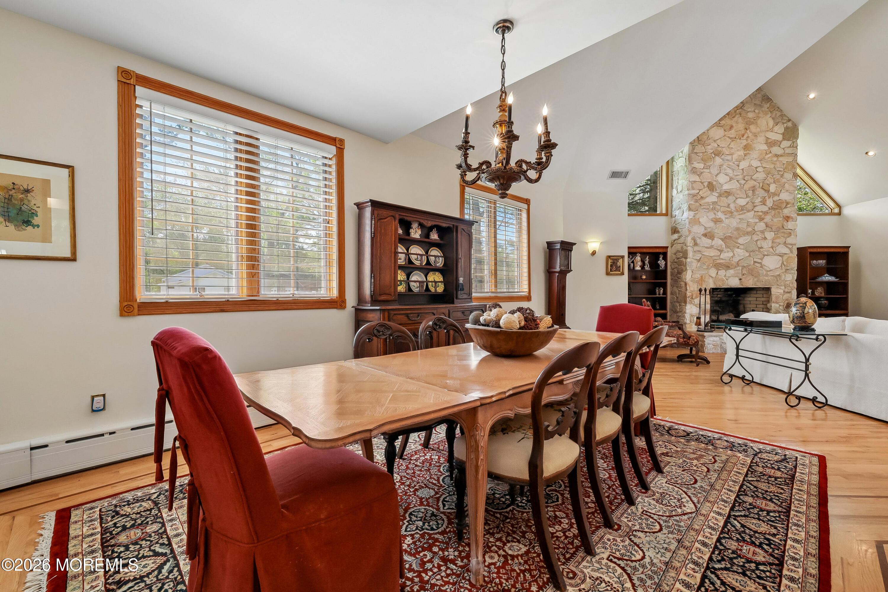 187 Hockhockson Road Colts Neck, NJ 07722 - Photo 15 of 55 a view of a dining room with furniture window and wooden floor