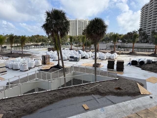 4201 North Ocean Boulevard, Unit 203 Boca Raton, FL 33431 - Photo 34 of 54 a view of a swimming pool with a patio and ocean view