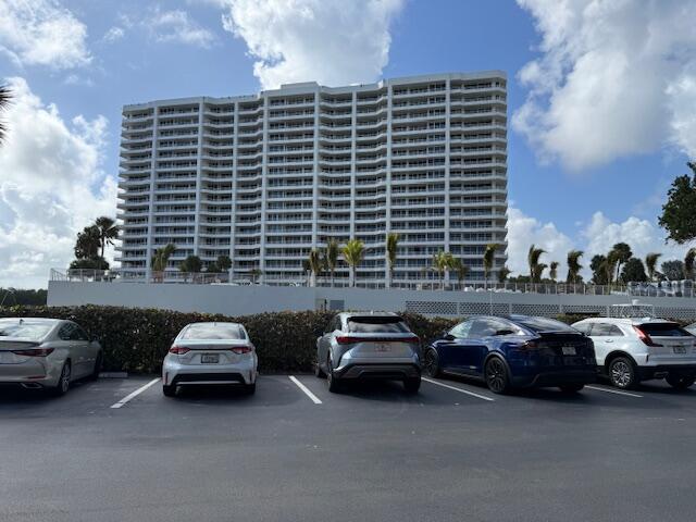 4201 North Ocean Boulevard, Unit 203 Boca Raton, FL 33431 - Photo 50 of 54 a couple of cars parked in a parking lot