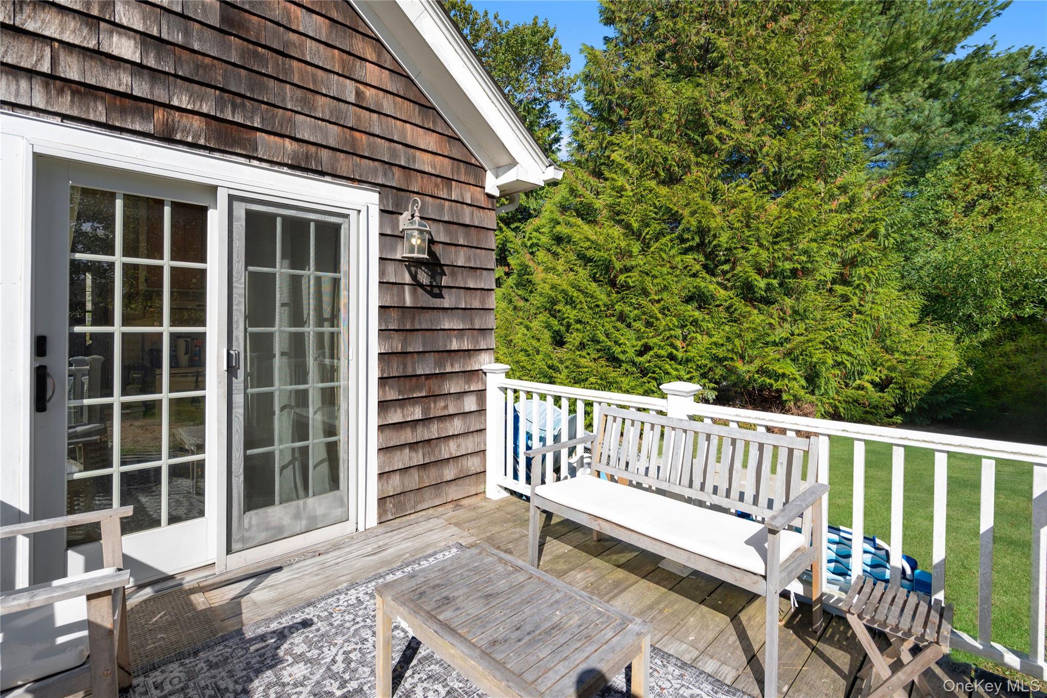 313 Forest Road West Mastic Beach, NY 11951 - Photo 17 of 19 a view of a deck