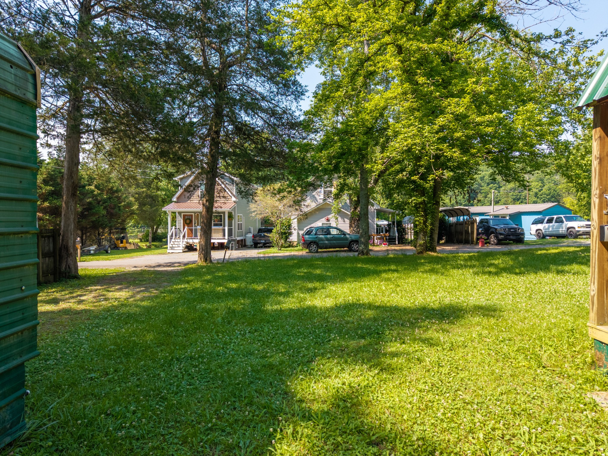 23 Lincoln Lake Road Kelso, TN 37348 - Photo 11 of 11 a view of house with garden space and trees