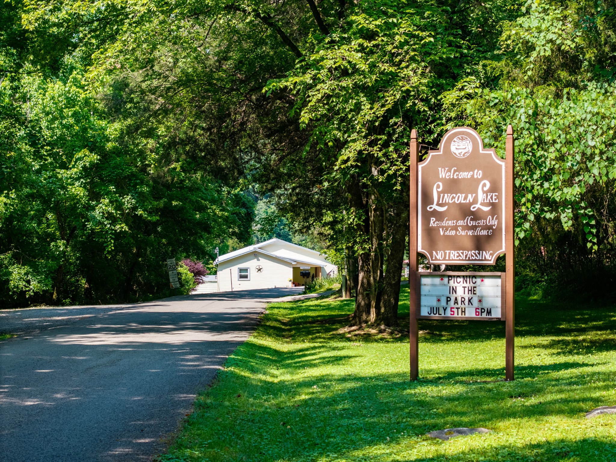 23 Lincoln Lake Road Kelso, TN 37348 - Photo 3 of 11 a front view of a house with garden