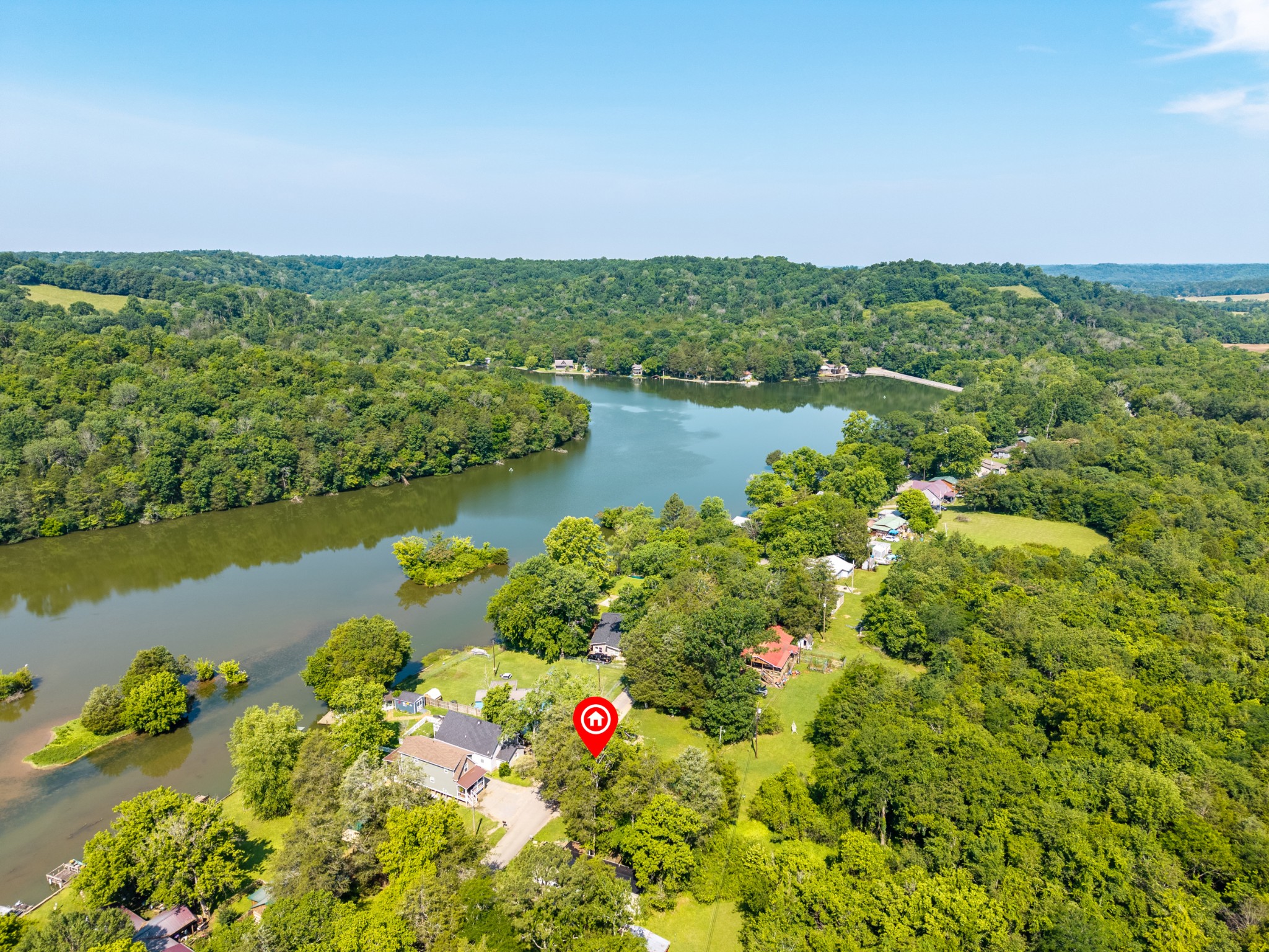 23 Lincoln Lake Road Kelso, TN 37348 - Photo 4 of 11 a view of a lake with a city