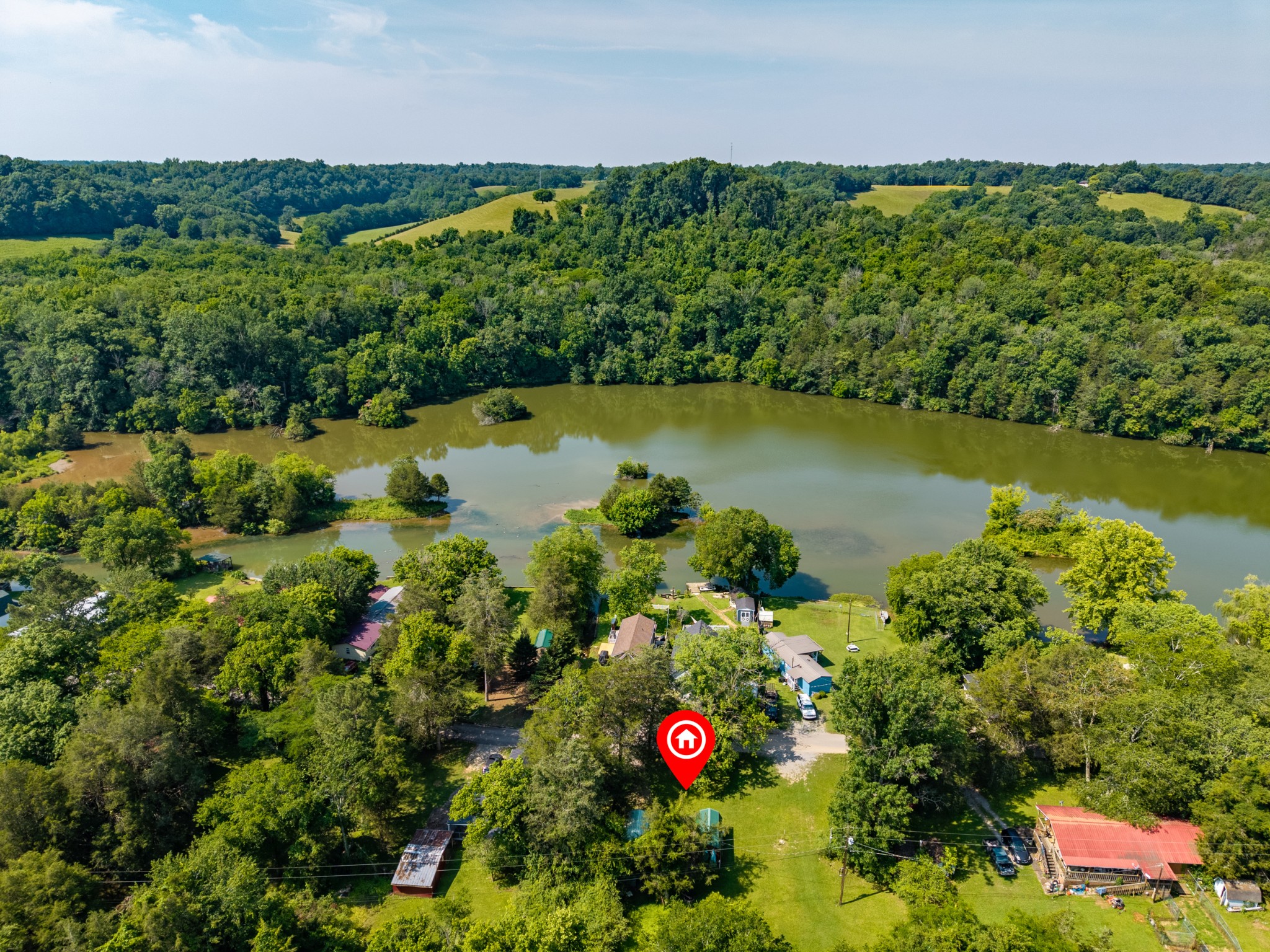 23 Lincoln Lake Road Kelso, TN 37348 - Photo 5 of 11 an aerial view of residential house with outdoor space and swimming pool