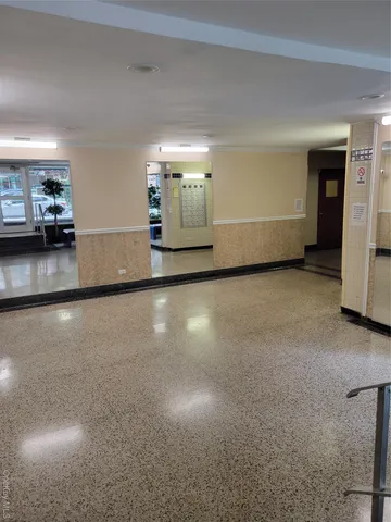 a view of a livingroom with furniture and window