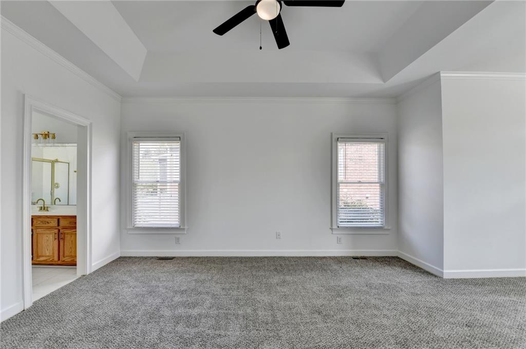 1005 Lewis Ridge Circle Lawrenceville, GA 30045 - Photo 27 of 74 an empty room with windows