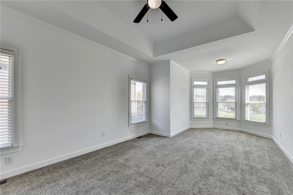 1005 Lewis Ridge Circle Lawrenceville, GA 30045 - Photo 28 of 74 a view of an empty room with a window