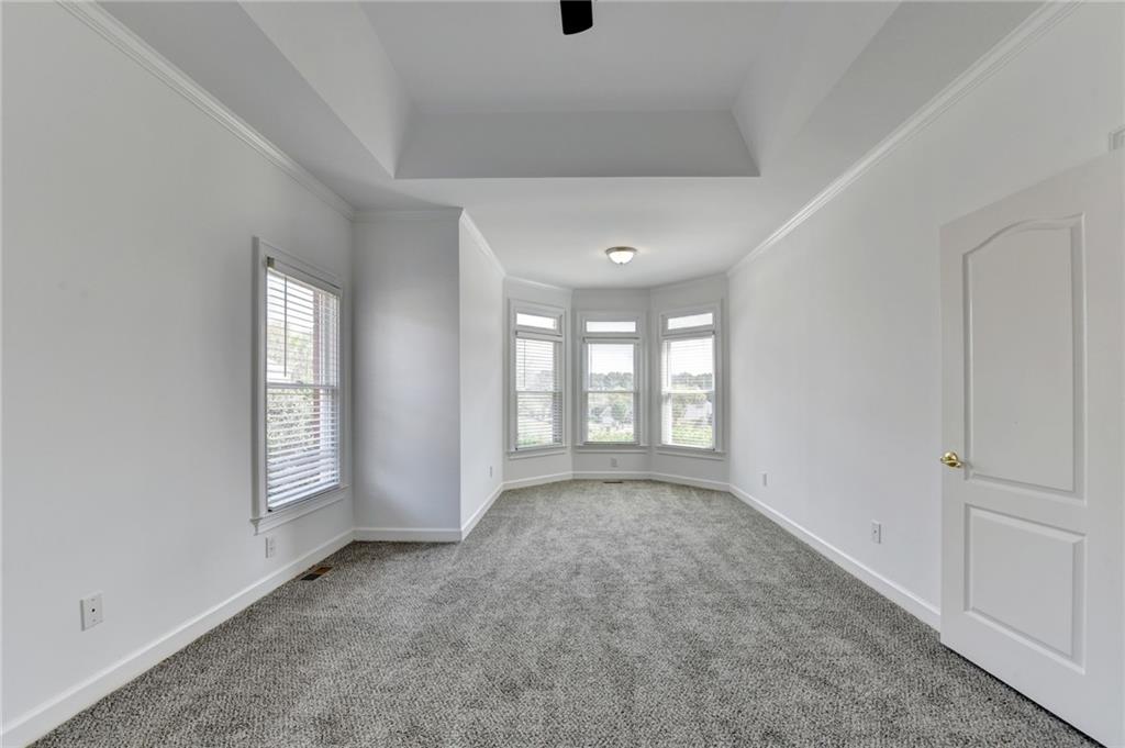 1005 Lewis Ridge Circle Lawrenceville, GA 30045 - Photo 29 of 74 a view of an empty room with a window