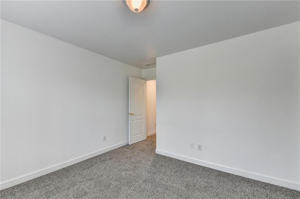 1005 Lewis Ridge Circle Lawrenceville, GA 30045 - Photo 39 of 74 a view of an empty room
