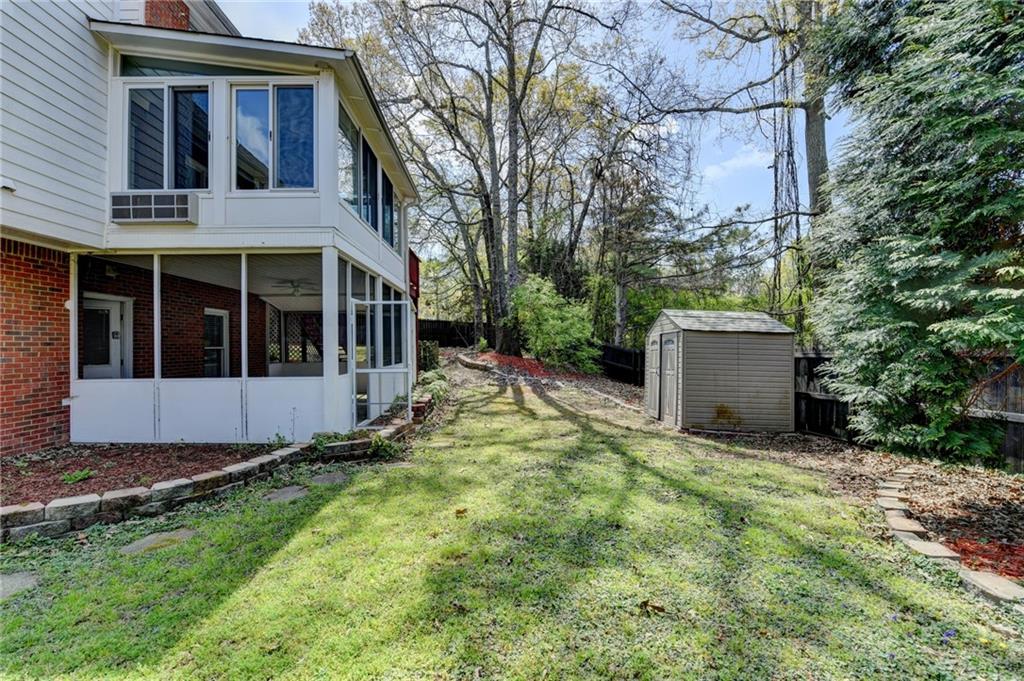 1005 Lewis Ridge Circle Lawrenceville, GA 30045 - Photo 64 of 74 a view of house with yard