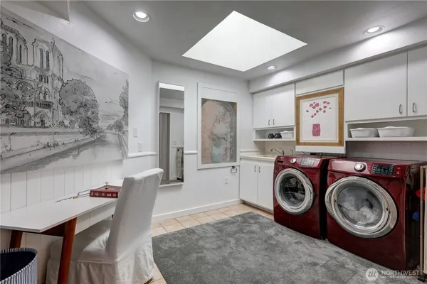 a view of kitchen with cabinets and wooden floor