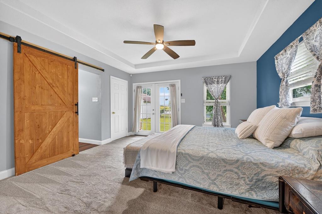 1808 Silver Creek Azle Road Azle, TX 76020 - Photo 16 of 32 a bedroom with a bed and window