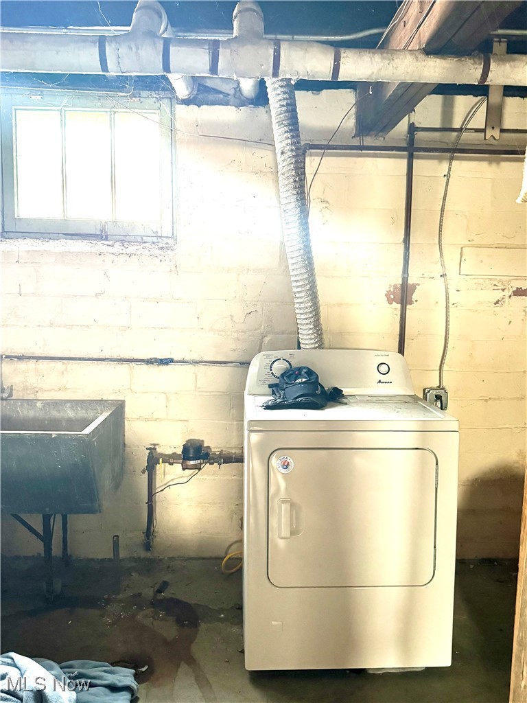 2152 Middlefield Road Cleveland, OH 44106 - Photo 40 of 50 Clothes washing area with washer / clothes dryer and sink