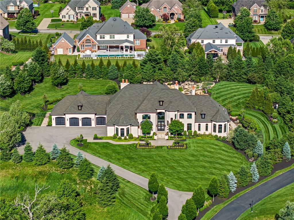 435 Myoma Road Mars, PA 16046 - Photo 1 of 50 Grand estate exterior with striking architectural lines, an expansive front lawn and a stately motor-court arrival.