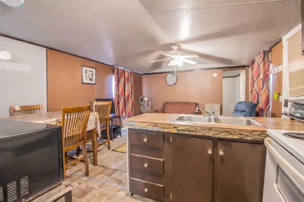 a bedroom with a bed and dresser