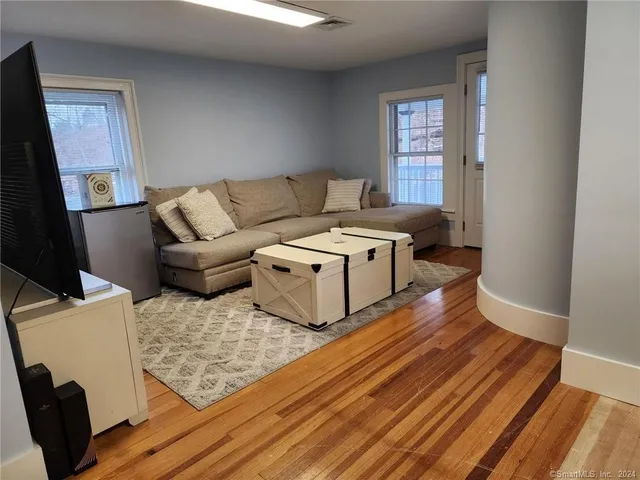 a living room with furniture and a couch