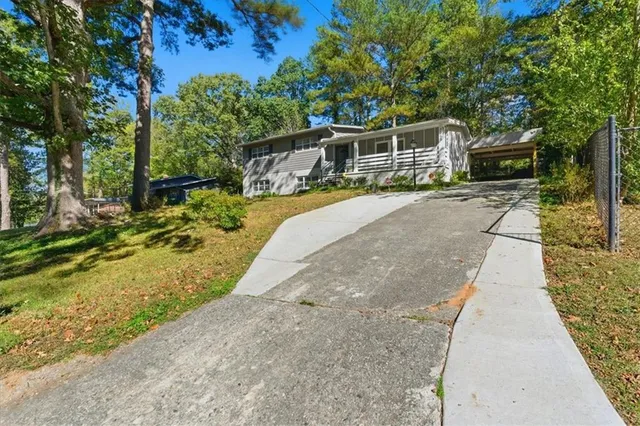 a house view with a outdoor space