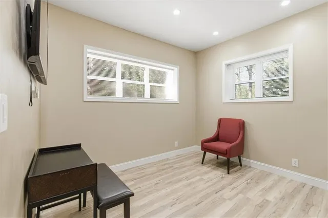 a room with furniture and a window