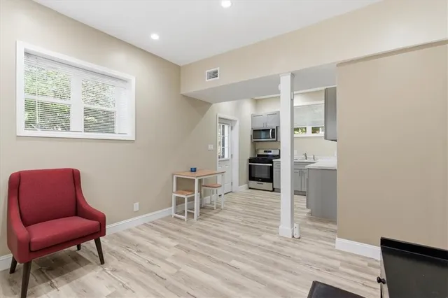 a room with furniture and a chair