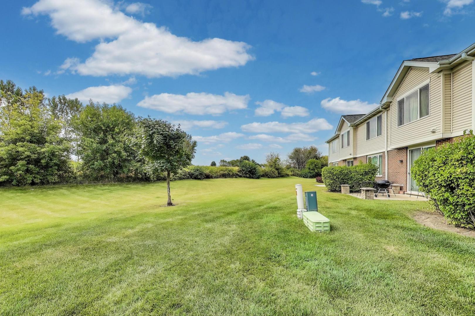 1113 Draper Road McHenry, IL 60050 - Photo 24 of 25 a view of an house with a garden