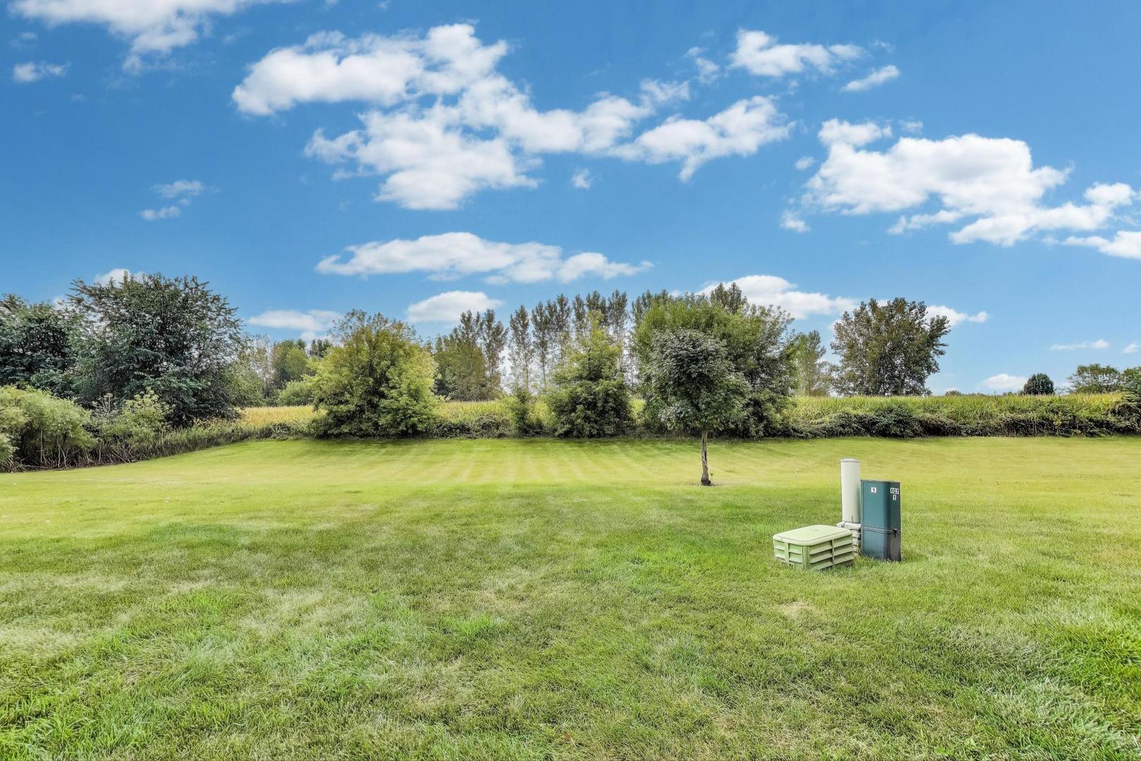 1113 Draper Road McHenry, IL 60050 - Photo 25 of 25 a view of a golf course with a lake