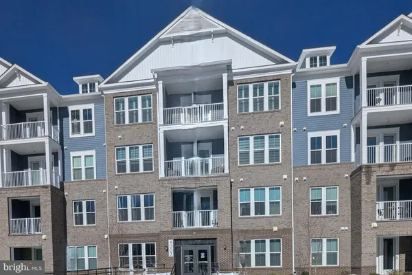 a front view of multi story residential apartment building